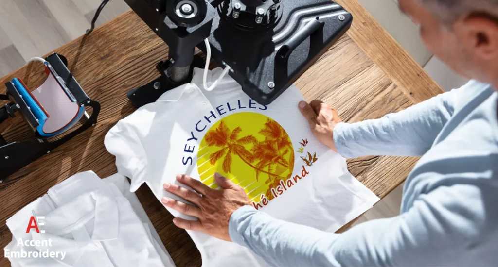 A man at a sewing machine works on making a t shirt, illustrating custom t shirt printing in action