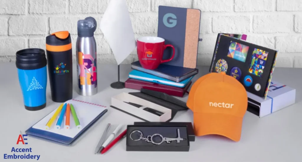 Various promotional products including a pen, notebook, coffee cup, and hat, highlighting effective branding tools for
